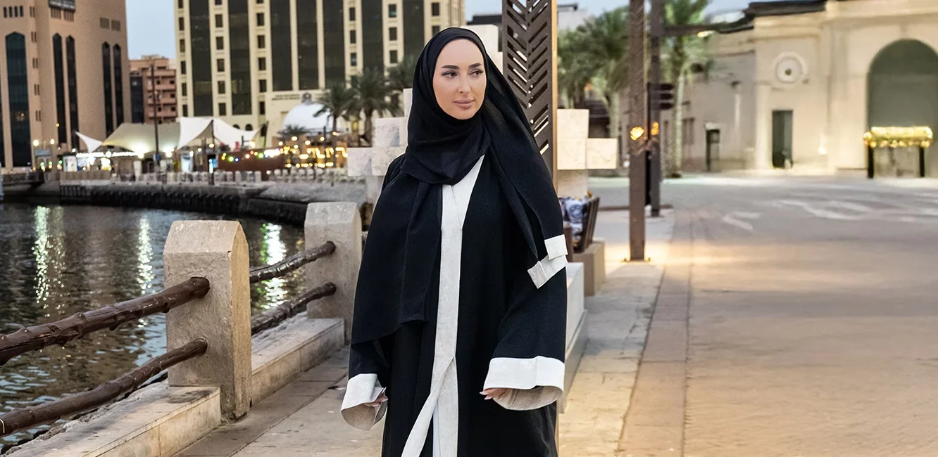 A black abaya with a black hijab
