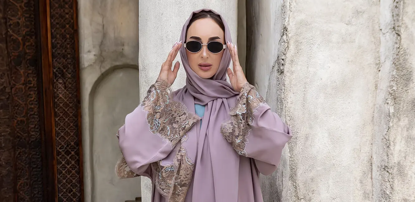 an abaya made with floral embroidery pattern