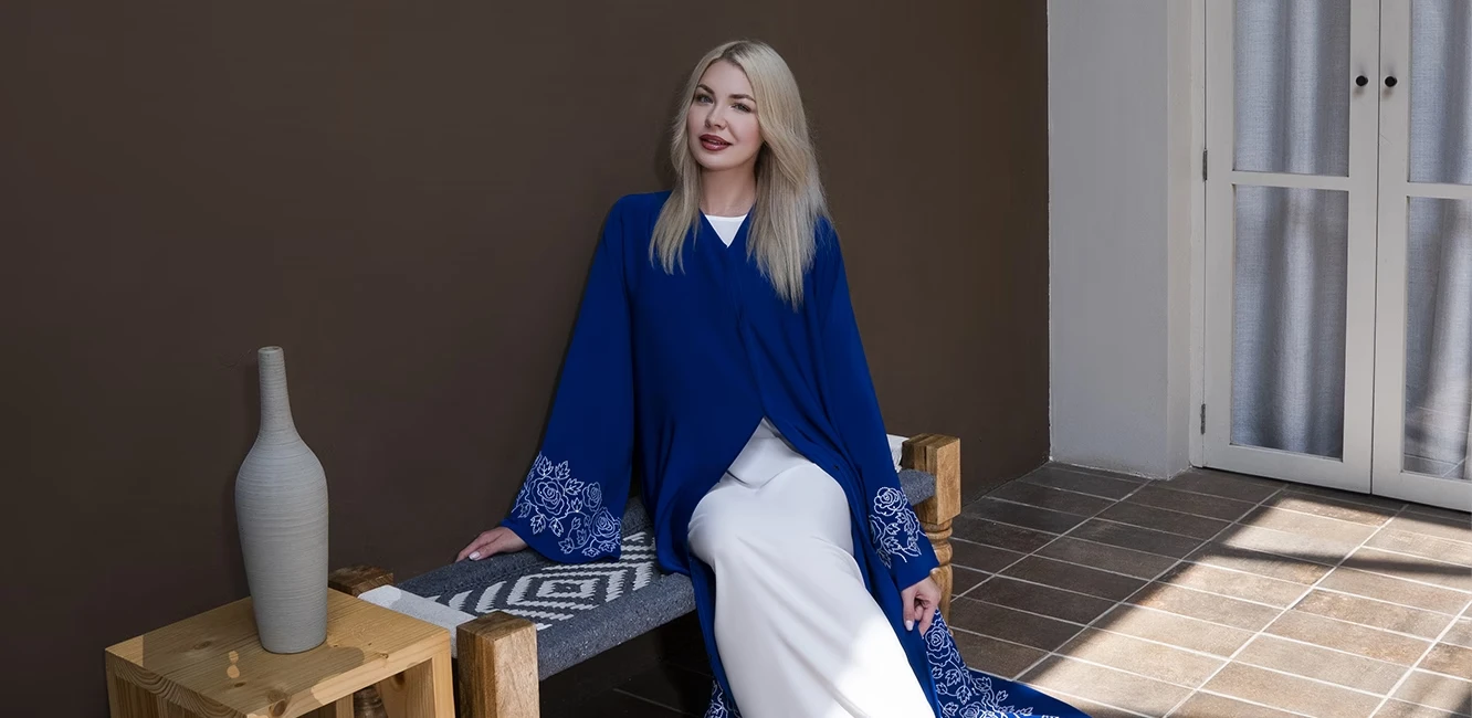A floral embroidery abaya in cobalt blue color