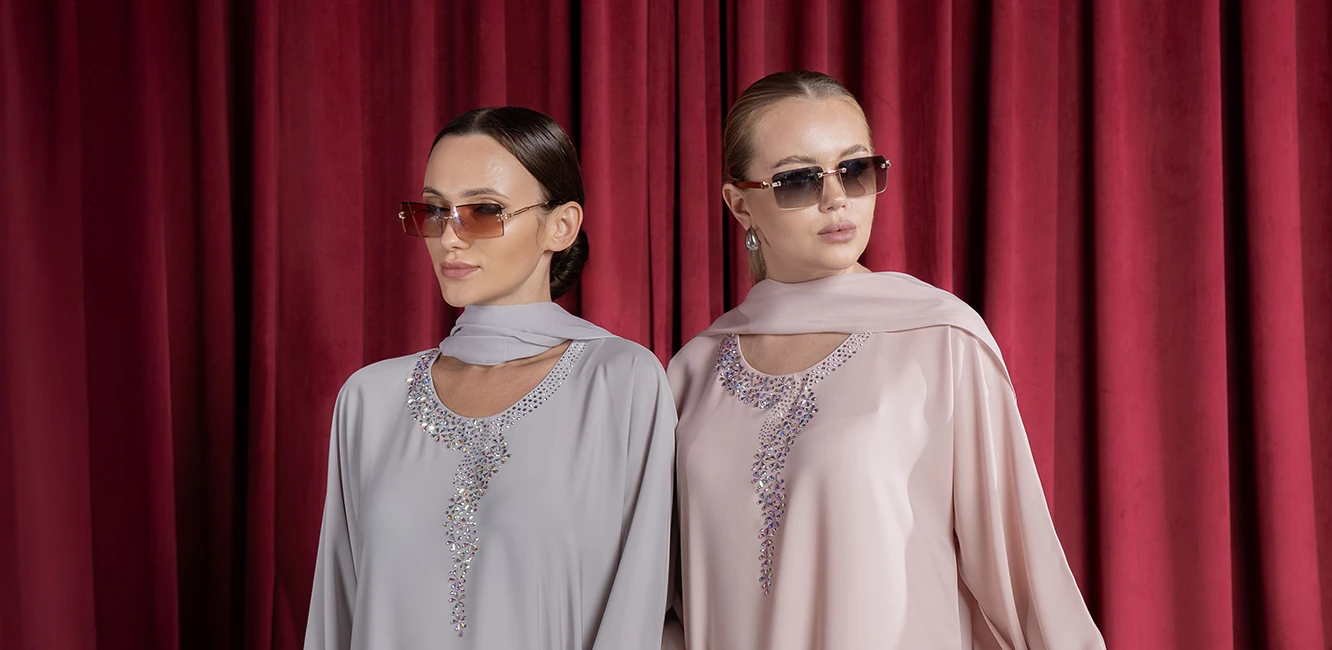Abayas made from pastel-toned fabric